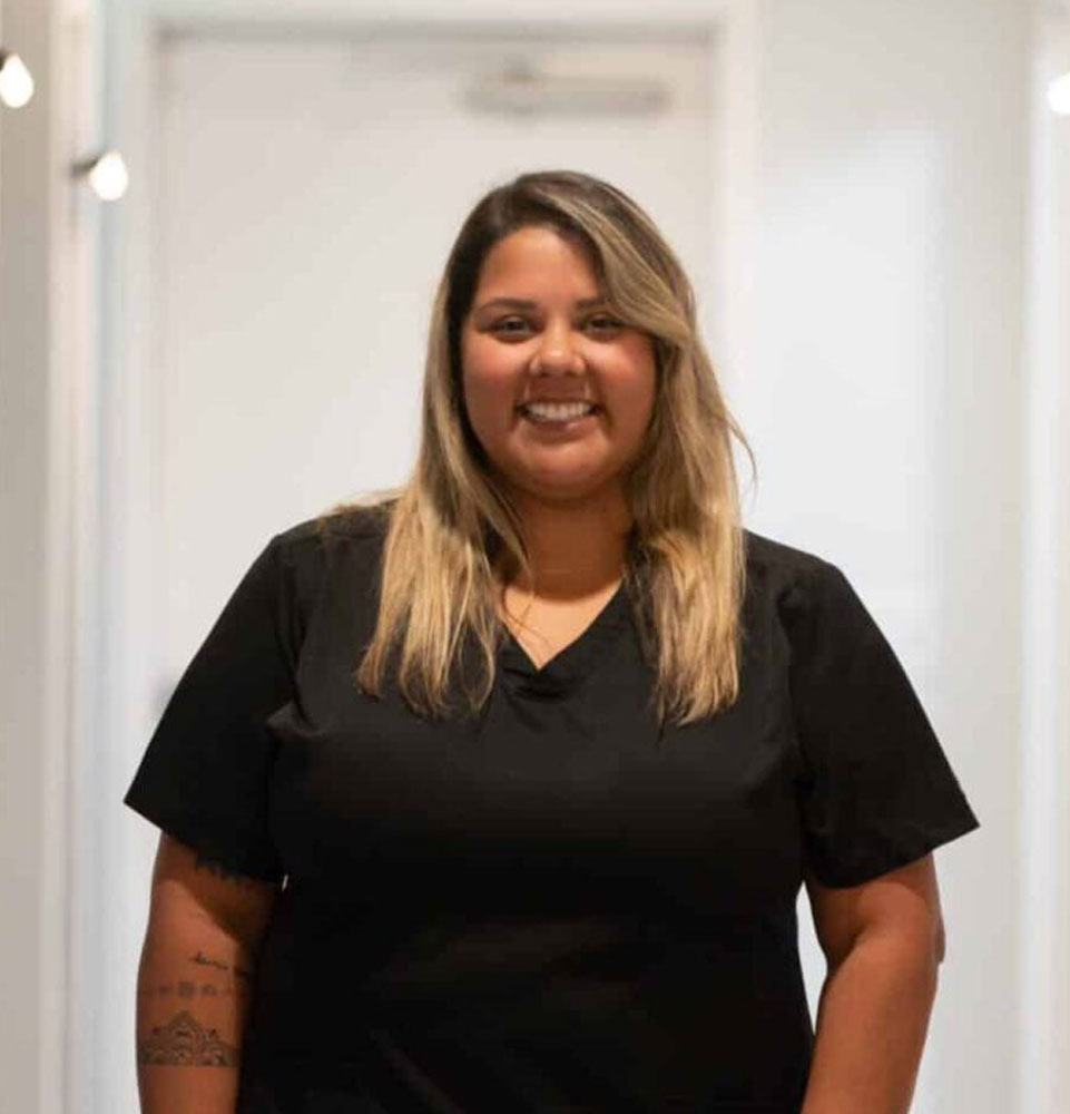 headshot of staff member inside of the dental center