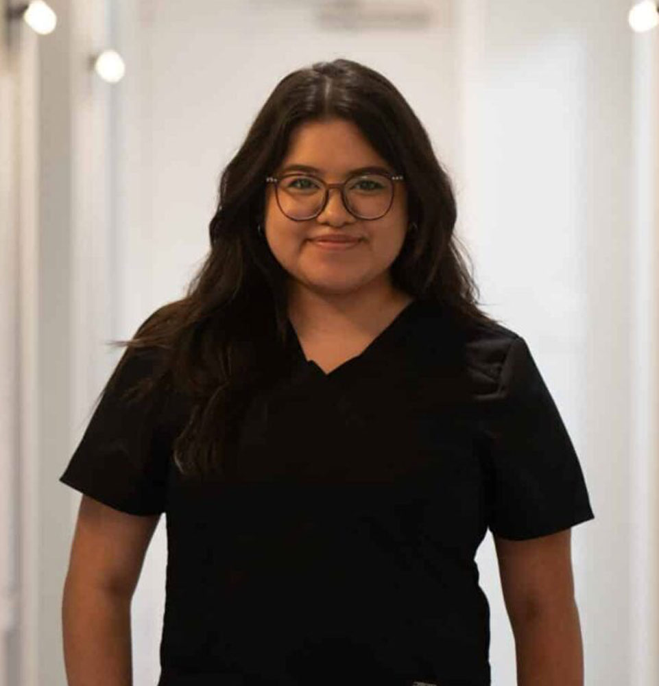 headshot of staff member inside of the dental center