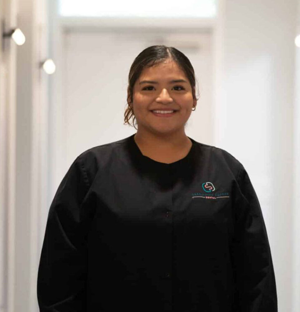 headshot of staff member inside of the dental center