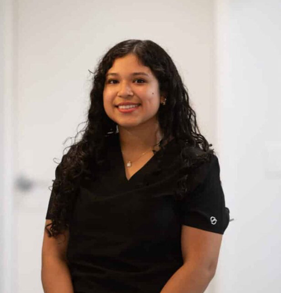 headshot of staff member inside of the dental center