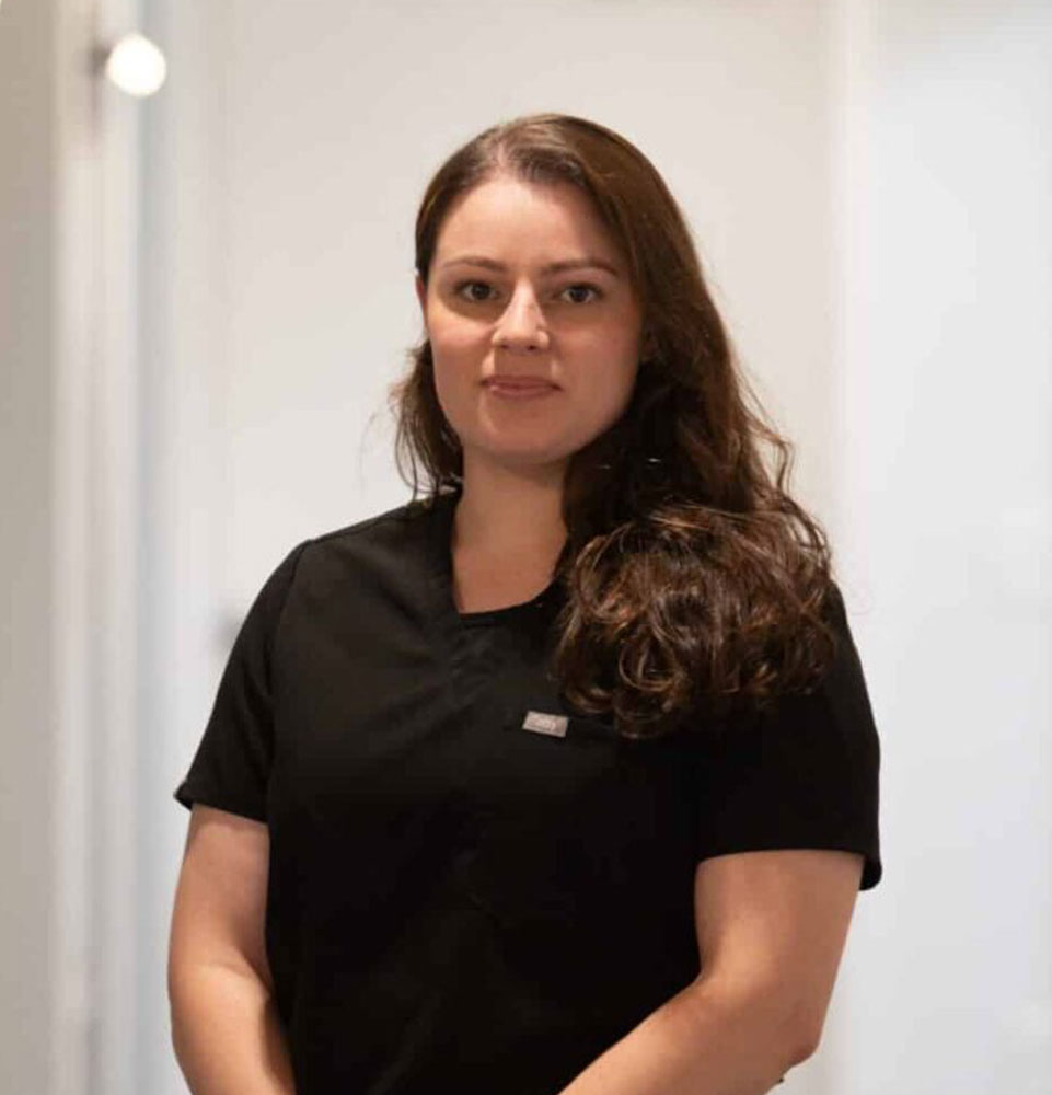 headshot of staff member inside of the dental center
